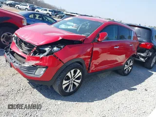 2011 Kia Sportage EX with VIN KNDPC3A22B7013561, listed as a IAAI auction lot 41785301 with 136,498 mi miles and . Bid and sale history available at carsss.com. Image 2.