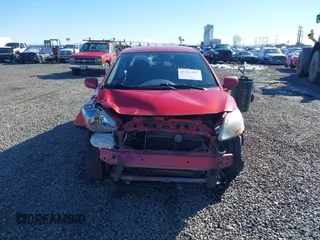 2009 Toyota Yaris z VIN JTDBT903391315199, wystawiony jako IAAI lot #41557557 z przebiegiem 188 971 mil mil oraz . Historia ofert i sprzedaży dostępna na DreamBid. Obrazek 12.