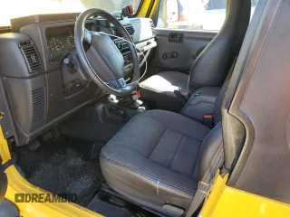2002 Jeep Wrangler X with VIN 1J4FA39S42P725876, listed as a Copart auction lot 71789864 with 154,991 mi miles and Salvage Title. Bid and sale history available at carsss.com. Image 7.
