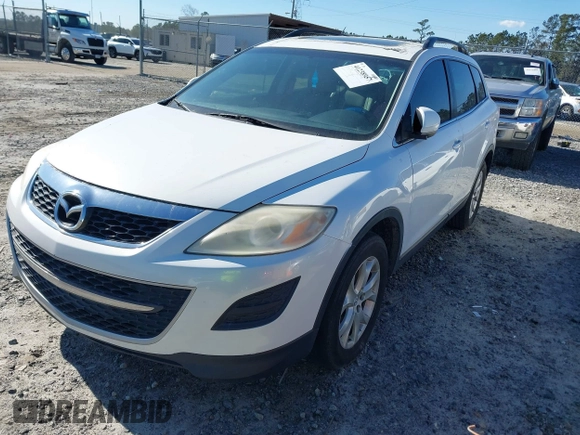 2011 Mazda CX-9 Touring with VIN JM3TB2CA0B0329959, listed as a IAAI auction lot 41238957 with 161,446 mi miles and . Bid and sale history available at DreamBid. Image 2.