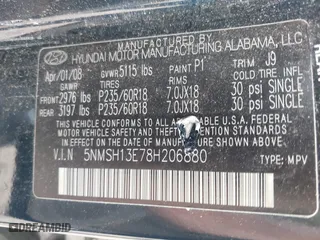 2008 Hyundai Santa Fe SE with VIN 5NMSH13E78H206880, listed as a IAAI auction lot 42036580 with 215,076 mi miles. Bid and sale history available at carsss.com. Image 9.