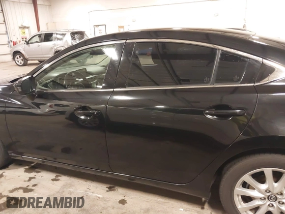 2016 Mazda 6 i Sport with VIN JM1GJ1U57G1433732, listed as a IAAI auction lot 41879844 with 107,269 mi miles and . Bid and sale history available at DreamBid. Image 14.