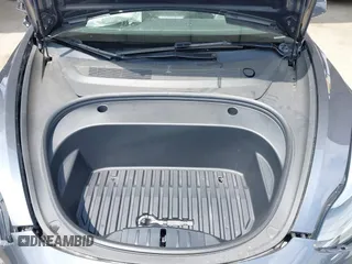 2023 Tesla Model 3 with VIN 5YJ3E1EA0PF518904, listed as a IAAI auction lot 42058540 with 20,945 mi miles and . Bid and sale history available at DreamBid. Image 10.