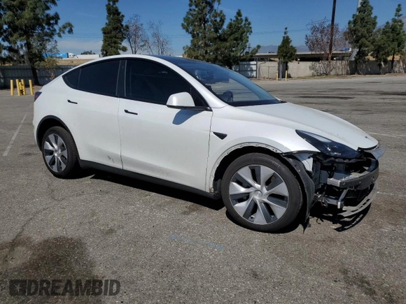 2022 Tesla Model Y Long Range with VIN 7SAYGDEE8NF551850, listed as a Copart auction lot 52747195 with 62,340 mi miles and Salvage Title. Bid and sale history available at carsss.com. Image 4.