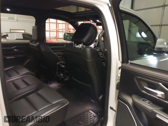 2021 Ram 1500 Laramie with VIN 1C6SRFJT6MN671456, listed as a IAAI auction lot 41087757 with 40,593 mi miles and . Bid and sale history available at DreamBid. Image 8.