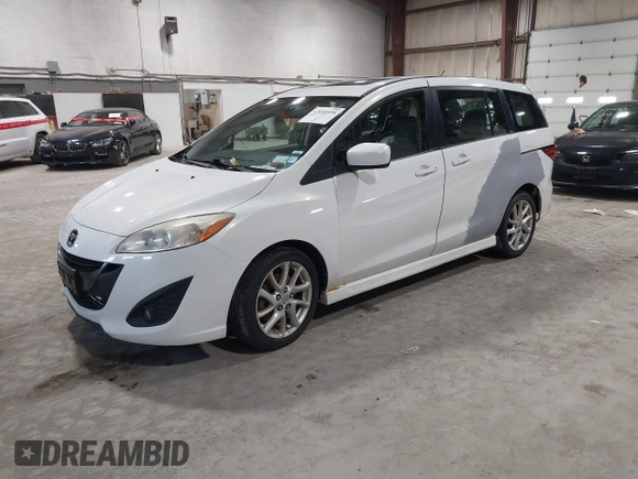 2012 Mazda 5 Grand Touring with VIN JM1CW2DL9C0100114, listed as a IAAI auction lot 42038998 with 160,651 mi miles and . Bid and sale history available at DreamBid. Image 2.