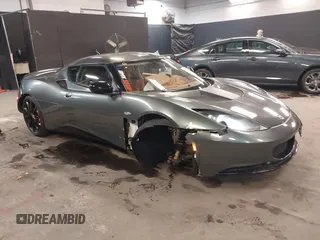 2013 Lotus Evora z VIN SCCLMDSU7DHA10025, wystawiony jako IAAI lot #41298776 z przebiegiem 18 194 mil mil oraz . Historia ofert i sprzedaży dostępna na DreamBid. Obrazek 1.