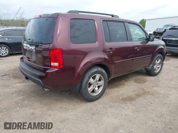 2009 Honda Pilot EX-L with VIN 5FNYF486X9B026041, listed as a IAAI auction lot 41942718 with 219,301 mi miles and . Bid and sale history available at carsss.com. Image 4.