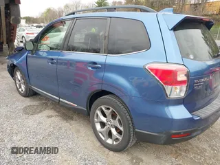 2017 Subaru Forester Touring with VIN JF2SJAWC1HH443799, listed as a IAAI auction lot 41943045 with 122,213 mi miles and . Bid and sale history available at DreamBid. Image 3.