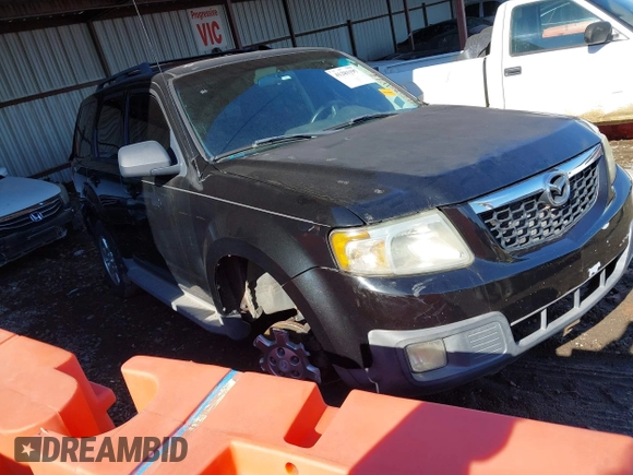 2011 Mazda Tribute Sport with VIN 4F2CY9C7XBKM06202, listed as a IAAI auction lot 41281197 with 195,443 mi miles and . Bid and sale history available at DreamBid. Image 1.