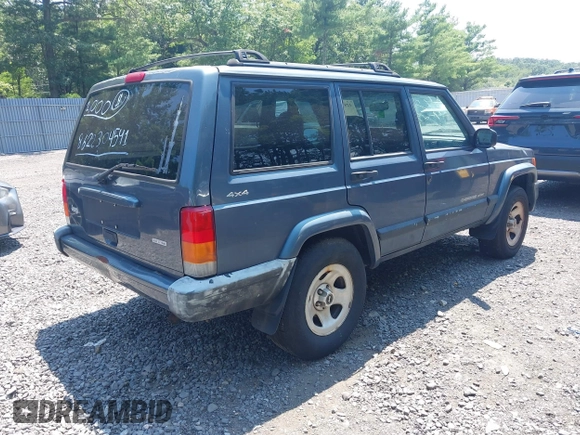 2001 Jeep Cherokee Sport z VIN 1J4FF48S71L572604, wystawiony jako IAAI lot #42817599 z przebiegiem 212 774 mil mil oraz . Historia ofert i sprzedaży dostępna na DreamBid. Obrazek 4.