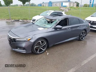 2018 Honda Accord Touring with VIN 1HGCV1F92JA005210, listed as a IAAI auction lot 42378040 with 69,294 mi miles and . Bid and sale history available at DreamBid. Image 2.