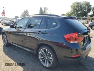 2015 BMW X1 sDrive28i with VIN WBAVM1C58FVZ94235, listed as a Copart auction lot 51948615 with 85,149 mi miles and Salvage Title. Bid and sale history available at carsss.com. Image 2.