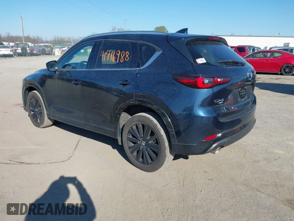 2022 Mazda CX-5 2.5 Turbo with VIN JM3KFBAY4N0534690, listed as a IAAI auction lot 41716988 with 23,910 mi miles and . Bid and sale history available at carsss.com. Image 3.