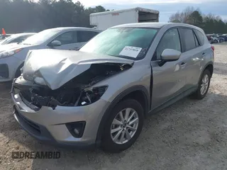 2015 Mazda CX-5 Touring with VIN JM3KE2CYXF0435583, listed as a IAAI auction lot 41737810 with 107,270 mi miles and . Bid and sale history available at DreamBid. Image 20.