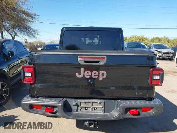 2020 Jeep Gladiator Rubicon z VIN 1C6JJTBG0LL117908, wystawiony jako IAAI lot #41621920 z przebiegiem 61 233 mil mil oraz . Historia ofert i sprzedaży dostępna na DreamBid. Obrazek 16.