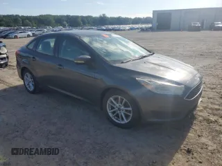 2015 Ford Focus SE with VIN 1FADP3F22FL344062, listed as a Copart auction lot 58136595 with 146,675 mi miles and Clean title. Bid and sale history available at DreamBid. Image 4.