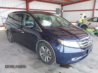 2017 Honda Odyssey Touring with VIN 5FNRL5H90HB017215, listed as a IAAI auction lot 42574528 with 61,386 mi miles and . Bid and sale history available at DreamBid. Image 1.