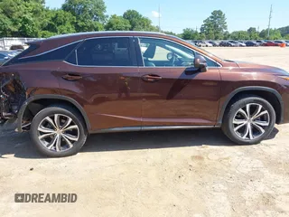 2016 Lexus RX 350 with VIN 2T2ZZMCA3GC005018, listed as a IAAI auction lot 42276197 with 136,692 mi miles and . Bid and sale history available at DreamBid. Image 14.