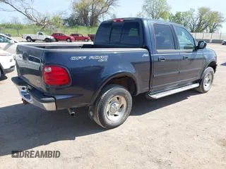 2001 Ford F-150 XLT with VIN 1FTRW08L71KA41543, listed as a IAAI auction lot 42205400 with 69,454 mi miles and . Bid and sale history available at DreamBid. Image 4.