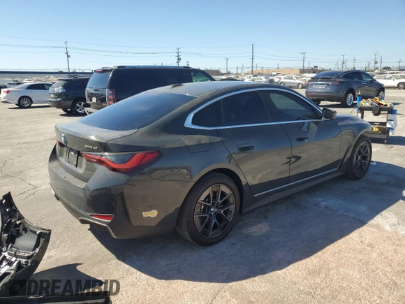 2022 BMW i4 eDrive40 z VIN WBY73AW02NFN19797, wystawiony jako Copart lot #72844893 z przebiegiem 14 353 mil mil oraz . Historia ofert i sprzedaży dostępna na DreamBid. Obrazek 3.