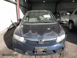 2009 Honda Civic Sdn LX with VIN 2HGFA16559H544472, listed as a IAAI auction lot 41695513 with 124,845 mi miles. Bid and sale history available at carsss.com. Image 12.