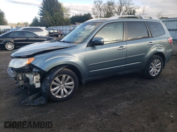 2011 Subaru Forester 2.5X Touring with VIN JF2SHAGCXBH752902, listed as a Copart auction lot 52102625 with 151,799 mi miles and Salvage Title. Bid and sale history available at carsss.com. Image 1.