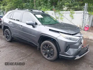 2022 Toyota RAV4 Hybrid SE with VIN JTM16RFV7ND067284, listed as a IAAI auction lot 42637821 with 20,512 mi miles and . Bid and sale history available at DreamBid. Image 1.