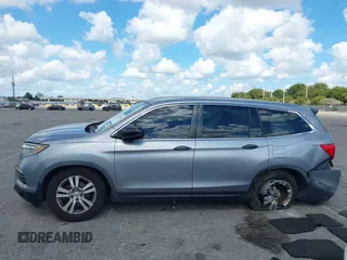 2016 Honda Pilot LX with VIN 5FNYF6H1XGB099987, listed as a IAAI auction lot 41556979 with 98,373 mi miles. Bid and sale history available at carsss.com. Image 14.