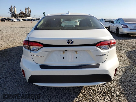 2021 Toyota Corolla Hybrid LE with VIN JTDEAMDE2MJ021576, listed as a Copart auction lot 49916105 with 24,292 mi miles and Salvage Title. Bid and sale history available at carsss.com. Image 6.