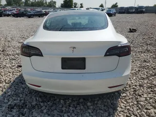 2023 Tesla Model 3 with VIN 5YJ3E1EA8PF449797, listed as a Copart auction lot 64601115 with 99,771 mi miles and Clean title. Bid and sale history available at DreamBid. Image 6.