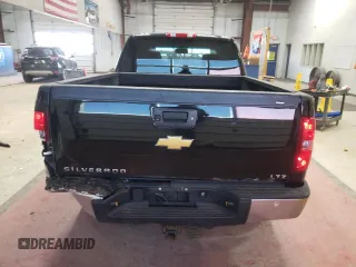 2013 Chevrolet Silverado 1500 LTZ with VIN 1GCRKTE72DZ414083, listed as a Copart auction lot 49009385 with 180,241 mi miles and Salvage Title. Bid and sale history available at DreamBid. Image 6.