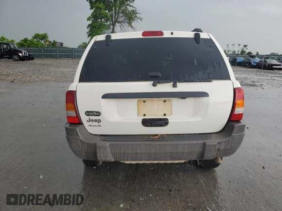 2004 Jeep Grand Cherokee Laredo z VIN 1J4GW48S74C165732, wystawiony jako Copart lot #56316885 z przebiegiem 177 139 mil mil oraz Szkoda całkowita • Salvage title. Historia ofert i sprzedaży dostępna na DreamBid. Obrazek 6.