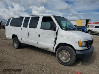 2002 Ford Econoline Wagon XL with VIN 1FBSS31L72HB03115, listed as a Copart auction lot 68837454 with 192,515 mi miles and Salvage Title. Bid and sale history available at carsss.com. Image 4.