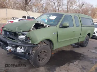 1997 Ford F-150 XL with VIN 1FTDX1861VKA60604, listed as a IAAI auction lot 41060909 with 269,715 mi miles. Bid and sale history available at carsss.com. Image 2.
