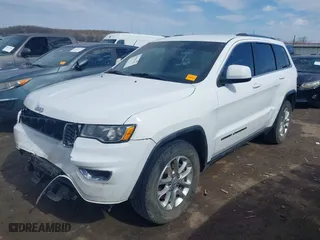 2021 Jeep Grand Cherokee Laredo X with VIN 1C4RJEAG2MC605574, listed as a IAAI auction lot 41642362 with 104,066 mi miles. Bid and sale history available at carsss.com. Image 18.