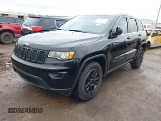 2018 Jeep Grand Cherokee Laredo E z VIN 1C4RJEAG1JC275535, wystawiony jako IAAI lot #41120357 z przebiegiem 108 109 mil mil oraz . Historia ofert i sprzedaży dostępna na DreamBid. Obrazek 17.