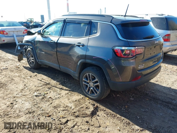 2018 Jeep Compass Latitude with VIN 3C4NJDBBXJT458268, listed as a IAAI auction lot 40965832 with 86,553 mi miles and . Bid and sale history available at DreamBid. Image 3.