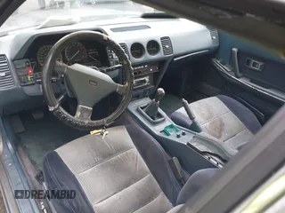 1987 Nissan 300ZX z VIN JN1HZ14S6HX217908, wystawiony jako IAAI lot #42271417 z przebiegiem 195 466 mil mil oraz . Historia ofert i sprzedaży dostępna na DreamBid. Obrazek 5.