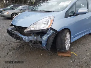 2009 Honda Fit Sport w/Navi with VIN JHMGE886X9S042490, listed as a IAAI auction lot 41931712 with 111,088 mi miles. Bid and sale history available at carsss.com. Image 6.