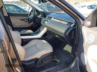2015 Land Rover Range Rover Evoque Prestige with VIN SALVV2BG1FH001240, listed as a IAAI auction lot 41768760 with 98,711 mi miles and . Bid and sale history available at DreamBid. Image 5.