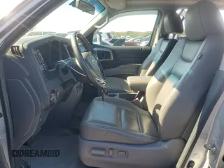 2012 Honda Ridgeline RTL with VIN 5FPYK1F55CB452206, listed as a Copart auction lot 74694204 with 128,226 mi miles and Clean Title. Bid and sale history available at carsss.com. Image 7.