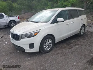 2016 Kia Sedona LX with VIN KNDMB5C1XG6182780, listed as a IAAI auction lot 41958613 with 133,747 mi miles. Bid and sale history available at carsss.com. Image 2.
