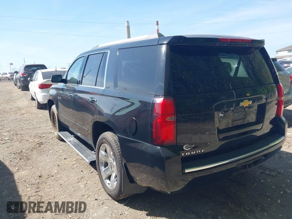 2015 Chevrolet Tahoe LTZ z VIN 1GNSKCKC8FR141163, wystawiony jako IAAI lot #42114008 z przebiegiem 221 804 mil mil oraz . Historia ofert i sprzedaży dostępna na DreamBid. Obrazek 3.