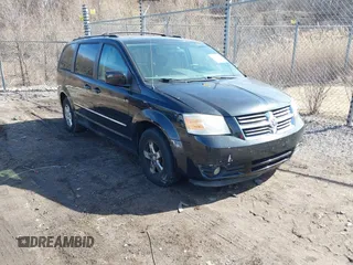 2009 Dodge Grand Caravan SXT z VIN 2D8HN54129R523223, wystawiony jako IAAI lot #41751321 z przebiegiem 189 459 mil mil oraz . Historia ofert i sprzedaży dostępna na DreamBid. Obrazek 1.