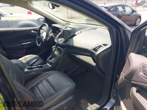 2015 Ford Escape Titanium with VIN 1FMCU9J96FUC01790, listed as a IAAI auction lot 42844336 with 133,005 mi miles and . Bid and sale history available at DreamBid. Image 5.