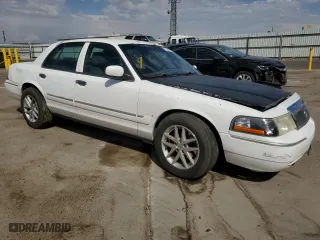 2004 Mercury Grand Marquis GS with VIN 2MEFM74W34X637265, listed as a Copart auction lot 72248594 with 139,039 mi miles and Salvage Title. Bid and sale history available at carsss.com. Image 4.