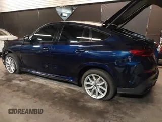 2022 BMW X6 M50i z VIN 5UXCY8C05N9J70601, wystawiony jako IAAI lot #42344397 z przebiegiem 49 085 mil mil oraz . Historia ofert i sprzedaży dostępna na DreamBid. Obrazek 3.