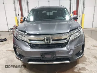 2019 Honda Pilot Touring 7-Passenger с VIN 5FNYF6H68KB082089, выставлен на аукционе IAAI как лот 42616148 с пробегом 69 913 миль миль и . История ставок и продаж доступна на DreamBid. Изображение 13.