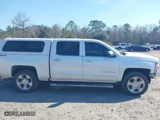 2017 Chevrolet Silverado 1500 LTZ with VIN 3GCUKSEC7HG311460, listed as a IAAI auction lot 41651225 with 146,054 mi miles. Bid and sale history available at carsss.com. Image 14.
